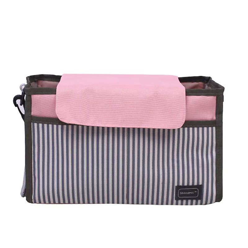 Multifunktionale Wickeltasche mit Kinderwagenbefestigung, gestreift, mit Verschlusslasche in Rosa.