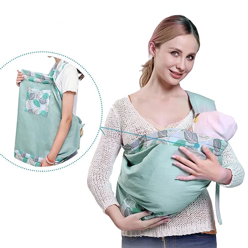 Multifunktionale Babytrage in zartem Grün mit Blattmuster, ideal für Neugeborene, ermöglicht diskretes Stillen und bequemes Tragen.